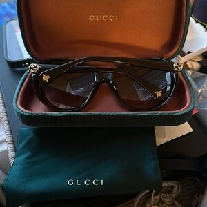Gucci sunglasses.